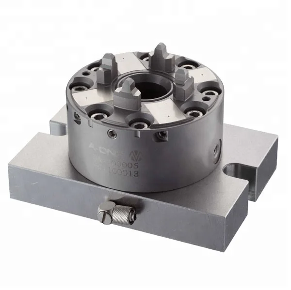 Erowa Machines-outils CNC Fixation Son mandrin de tour à 4 mors avec plaque de base