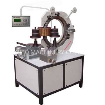 Machine automatique de bobinage de filtre toroïdal