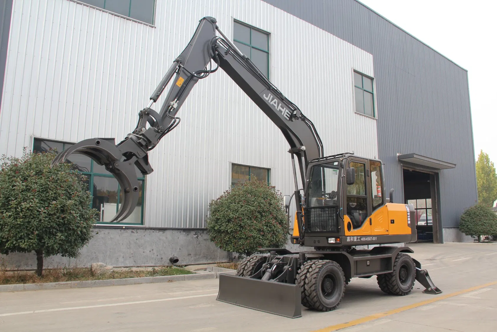 Jiahe 2026 Neu 7t 8t 9t 10,5t Forstwirtschaftlicher Radbagger Reifenbagger mit drehbarer Hydraulikgreifer für Forstwirtschaftliche Holzbearbeitung Schrottheben