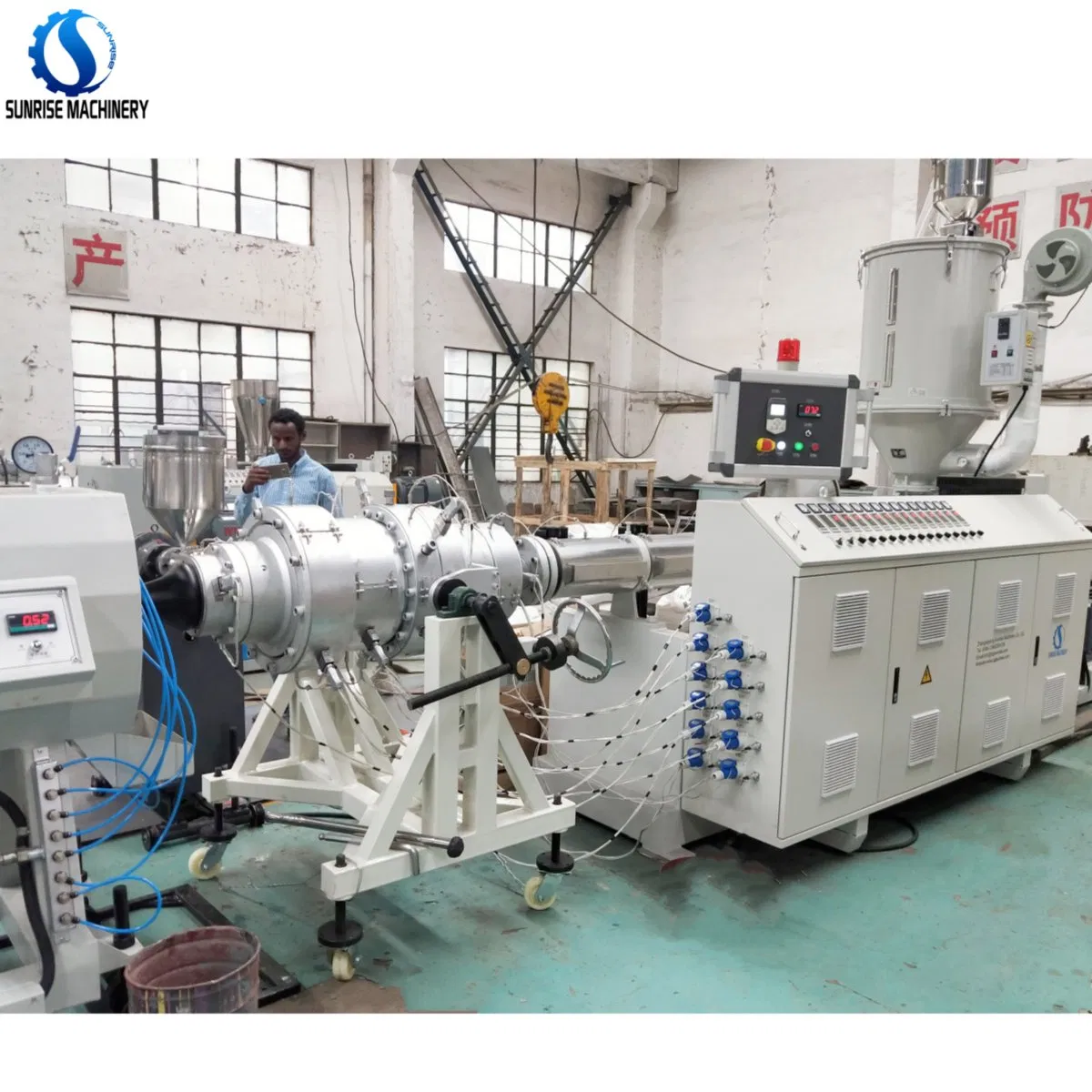 Ligne de production par extrusion de tuyaux en PEHD pour l'eau et le gaz