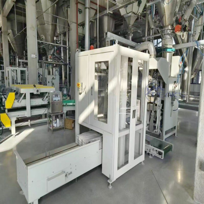 Macchina automatica multifunzione per il confezionamento di materiali refrattari Al2O3 da 25 kg e 30 kg in sacchi con valvola, con riempimento e sigillatura a ultrasuoni