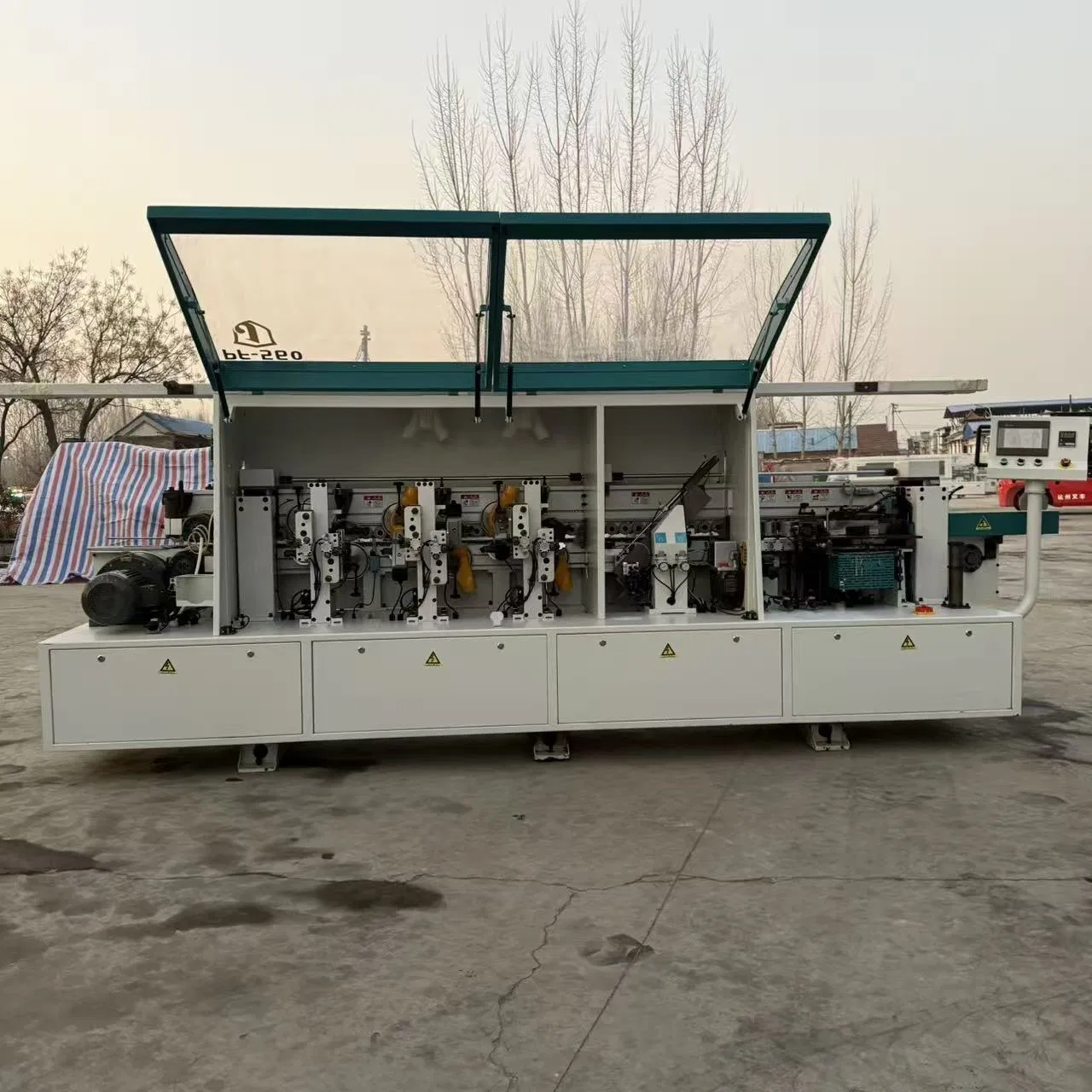 Macchina bordatrice bilaterale automatica ad alta velocità per l'industria della produzione di mobili