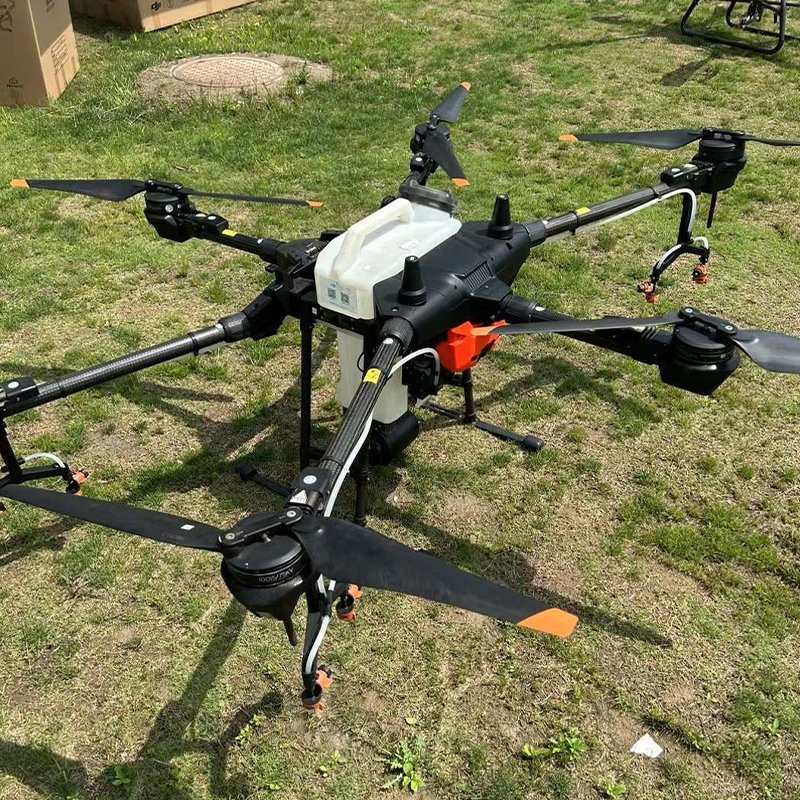 Dual-Purpose Agricultural Drone for Spraying and Fertilizer Spreading