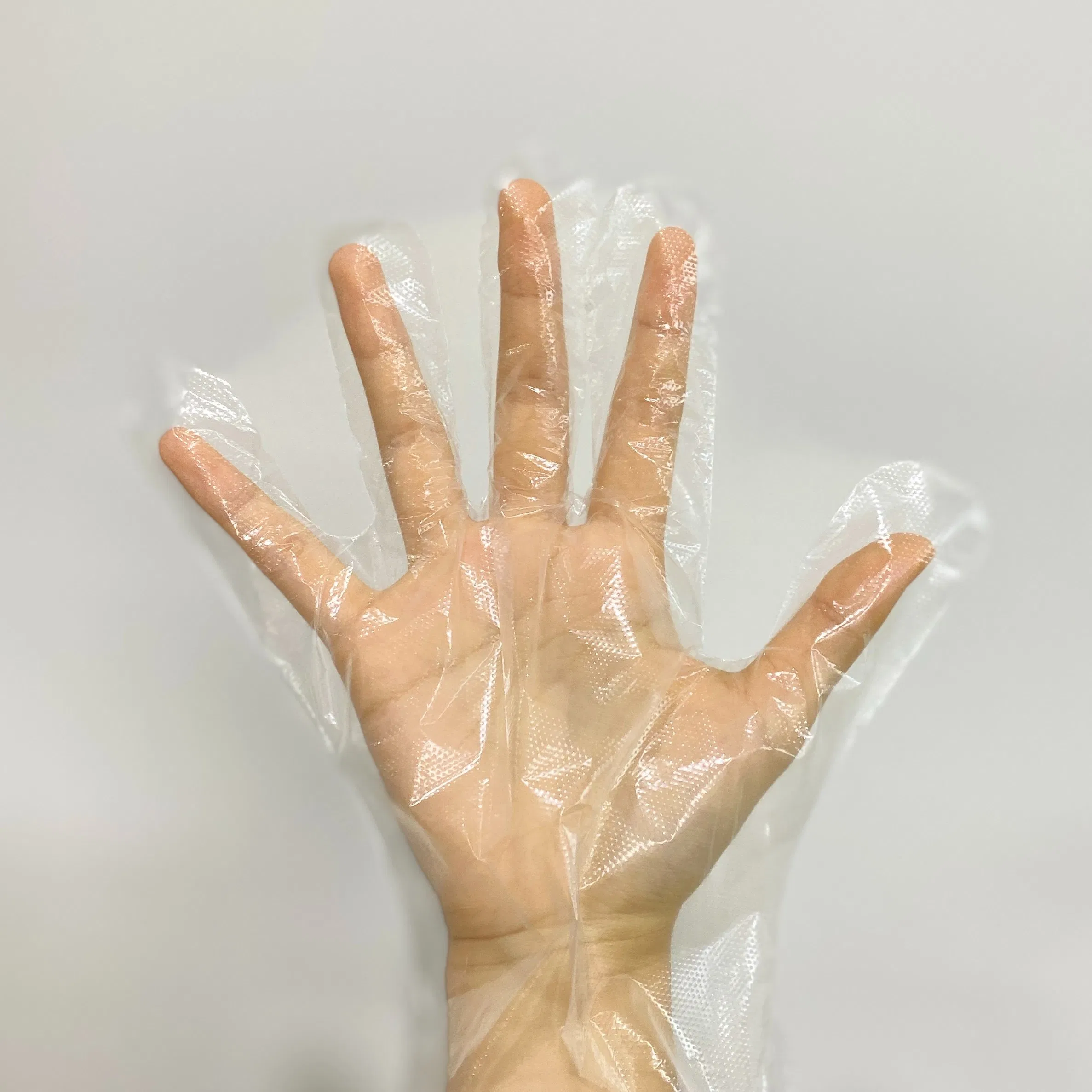 Gants jetables en poly doux et confortables pour un usage polyvalent
