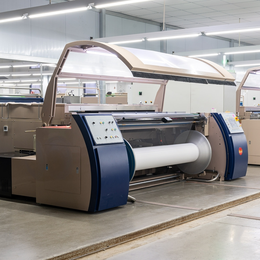 Macchina automatica ad alta velocità per la incollatura dei filati destinata alla produzione tessile