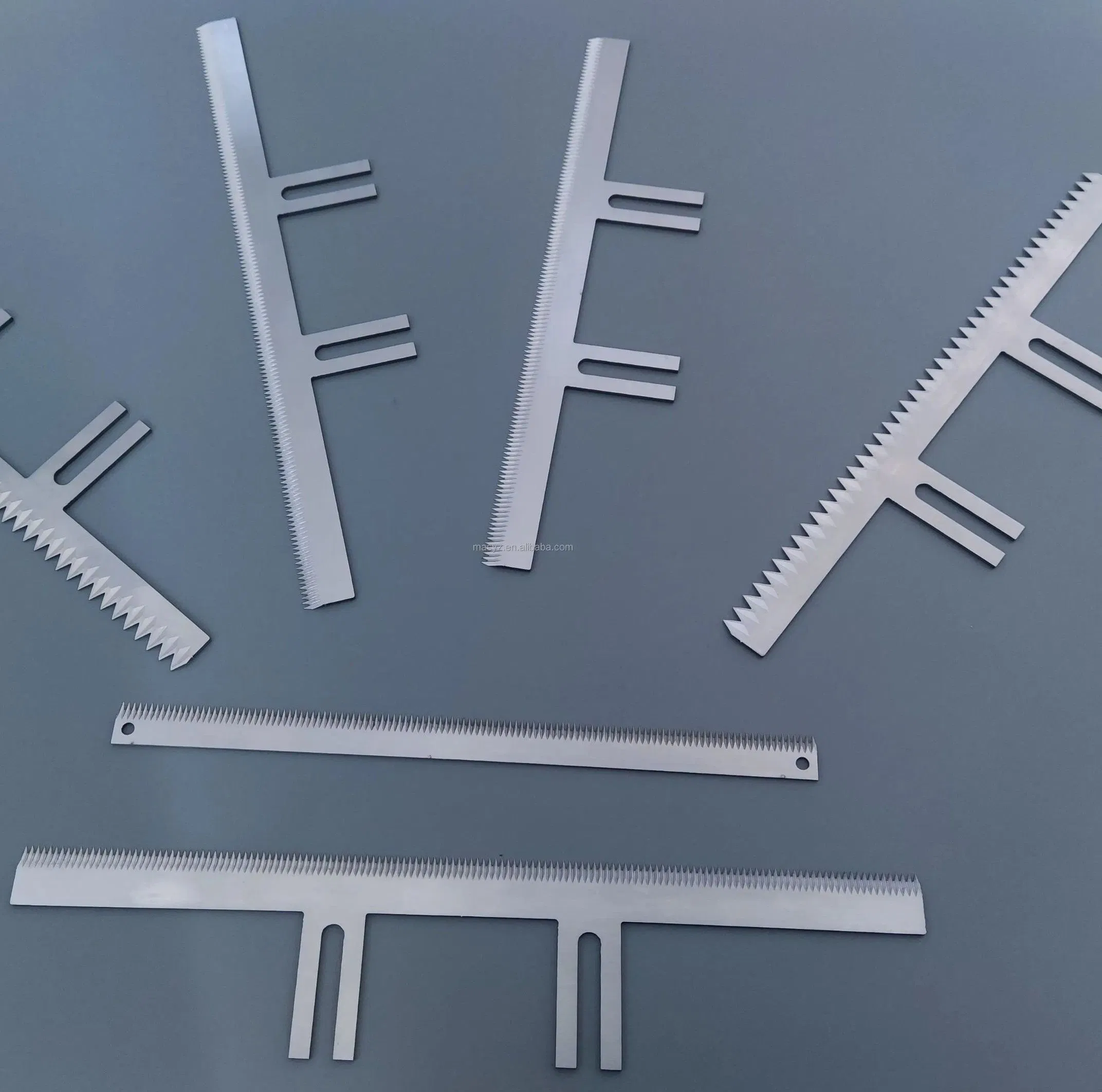 Taglierina per nastro adesivo, lama dentata, lama per macchina sigillatrice, film