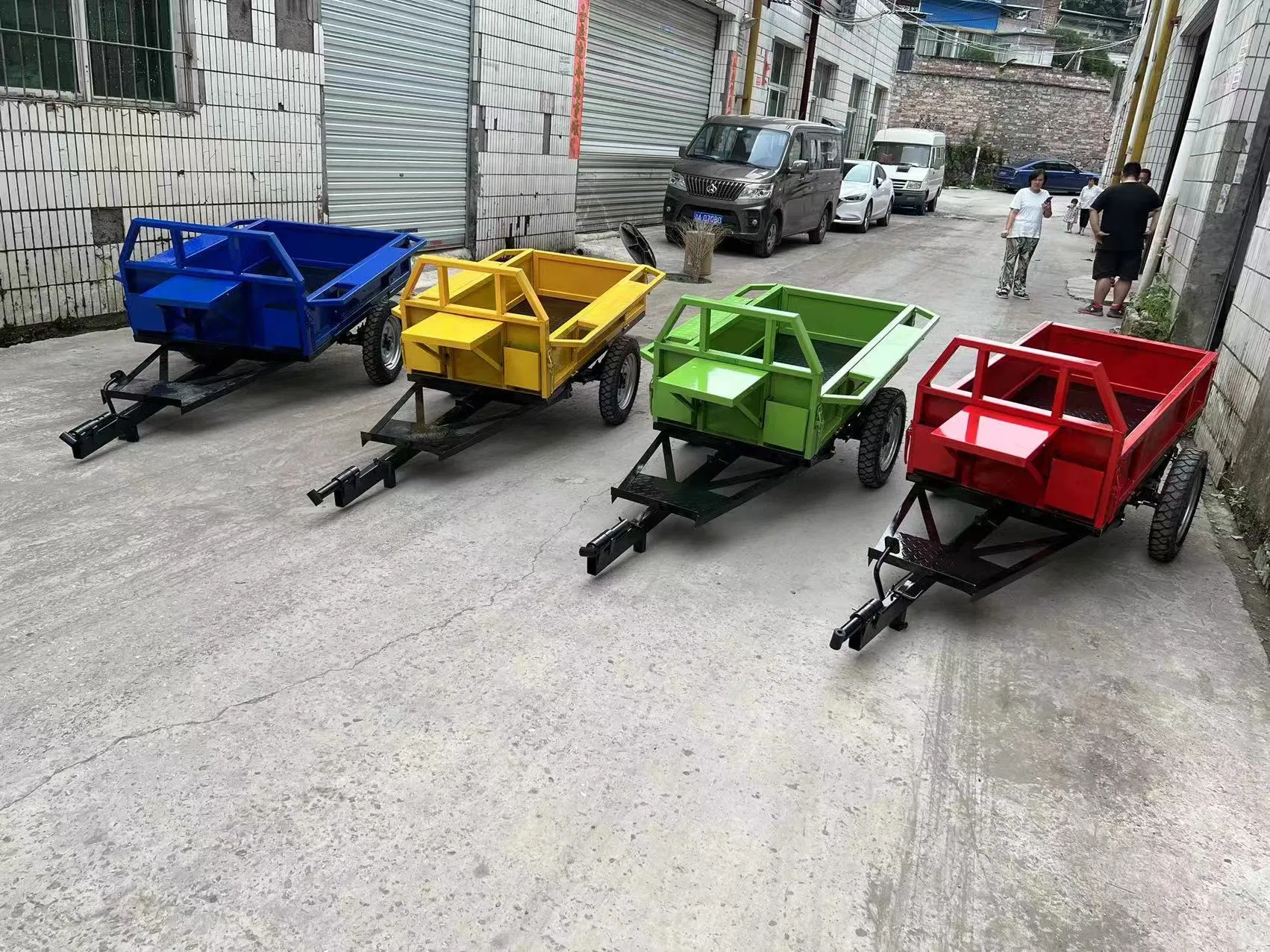 Pequeño remolque agrícola, de jardín, de volteo y para minigranja para motoazada, motocultor y tractor de empuje