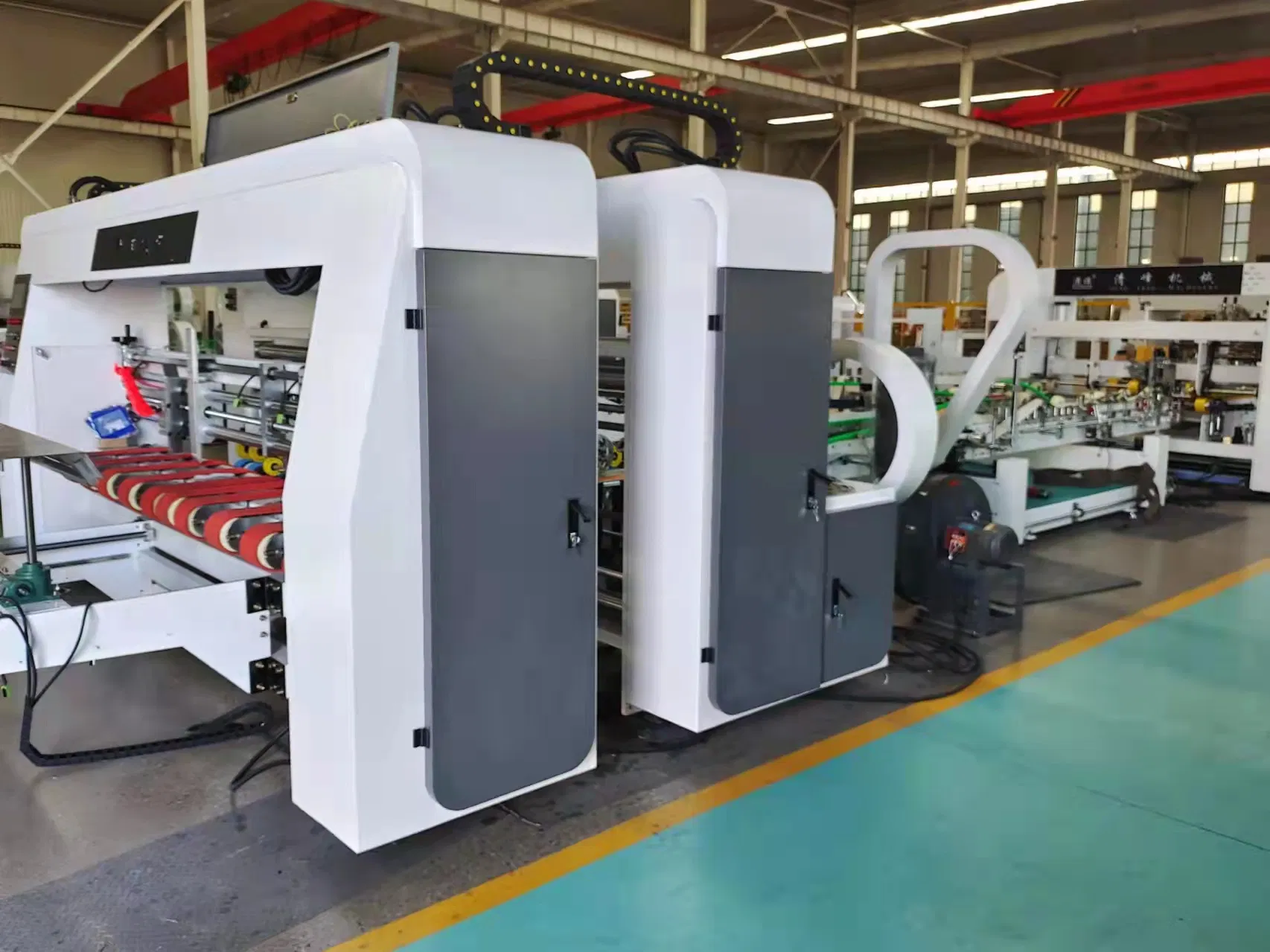 Macchina automatica per incollaggio e imballaggio di cartoni